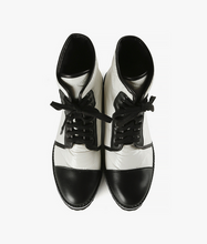 Load image into Gallery viewer, Top view of white and black boots