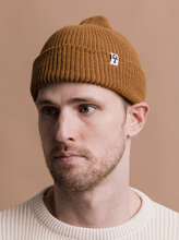 Load image into Gallery viewer, man wearing tan beanie