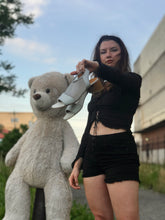 Load image into Gallery viewer, Silver mesh sandals with Black top and shorts next to teddy bear