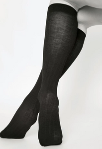 sheer black knee high socks black and white photo