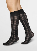 Load image into Gallery viewer, Tartan Knee High Black socks on woman&#39;s legs