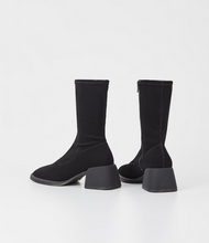 Load image into Gallery viewer, Black stretch boots with angled flared heels